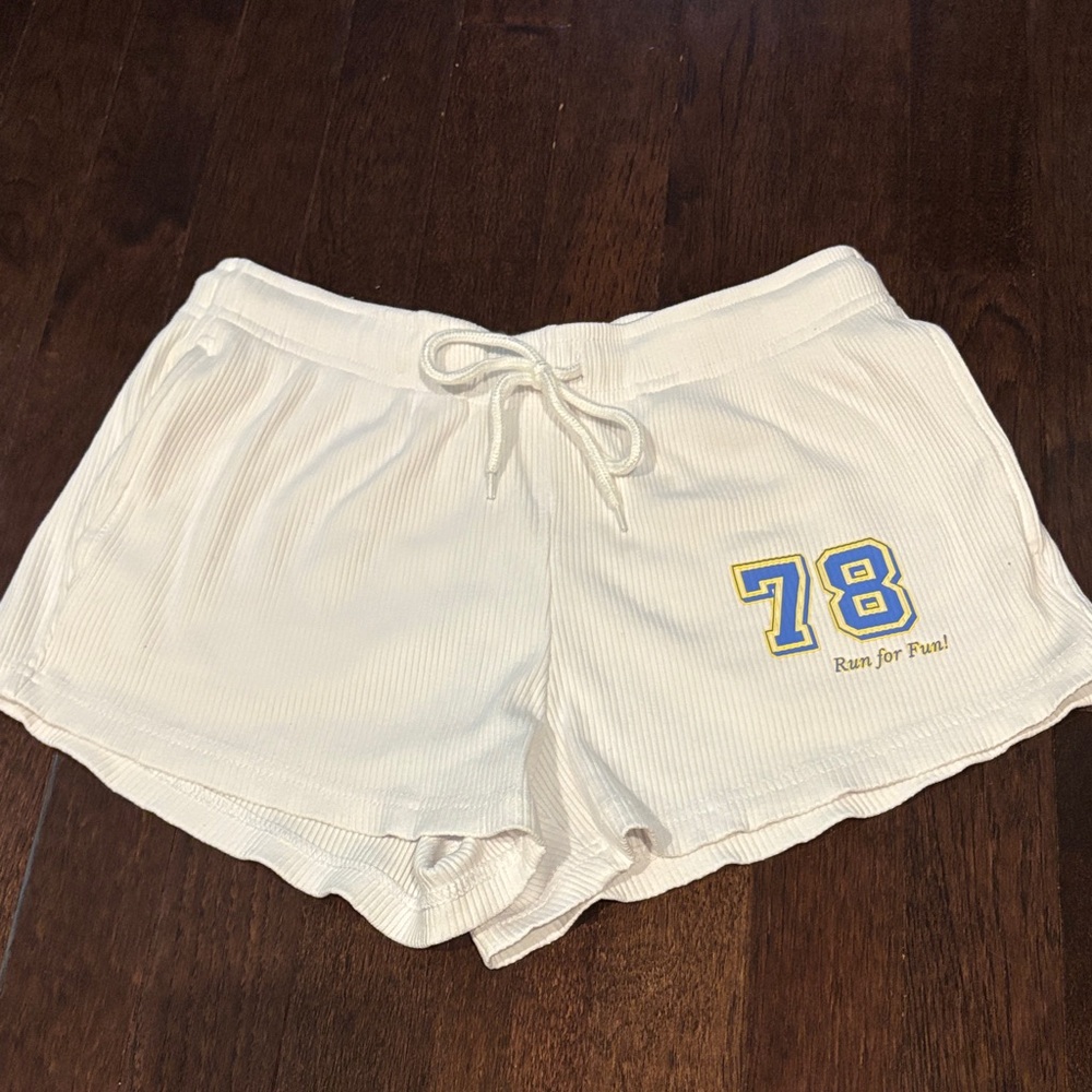Refuge White Athletic Shorts with Yellow Print